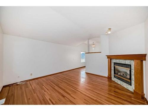 132 San Fernando Crescent Ne, Calgary, AB - Indoor Photo Showing Living Room With Fireplace