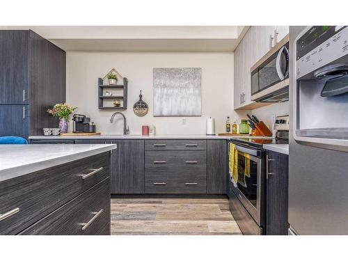 1201-298 Sage Meadows Park Nw, Calgary, AB - Indoor Photo Showing Kitchen