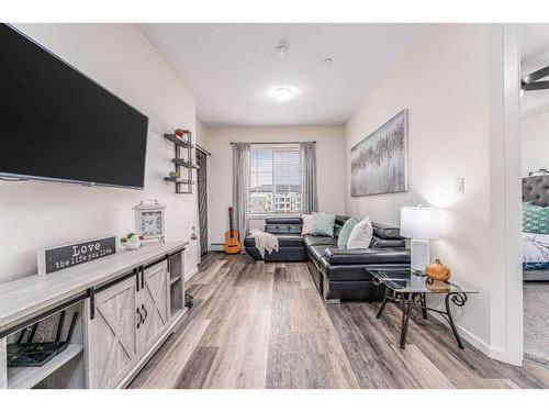 1201-298 Sage Meadows Park Nw, Calgary, AB - Indoor Photo Showing Living Room