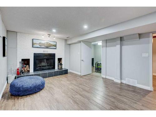 10304 8 Street Sw, Calgary, AB - Indoor Photo Showing Other Room With Fireplace