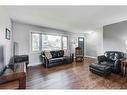 10304 8 Street Sw, Calgary, AB  - Indoor Photo Showing Living Room 