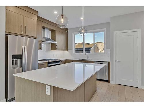 421 Chelsea Key, Chestermere, AB - Indoor Photo Showing Kitchen With Stainless Steel Kitchen With Upgraded Kitchen