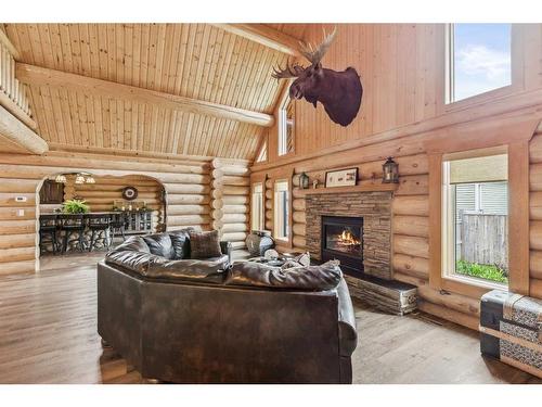 2 Wheatland Green, Strathmore, AB - Indoor Photo Showing Living Room With Fireplace