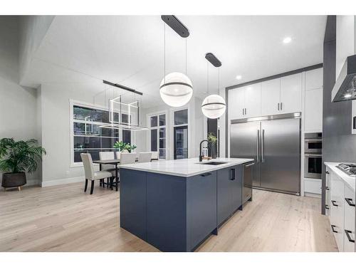 57 Rockcliff Terrace Nw, Calgary, AB - Indoor Photo Showing Kitchen With Stainless Steel Kitchen With Upgraded Kitchen