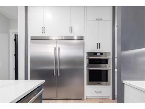 57 Rockcliff Terrace Nw, Calgary, AB - Indoor Photo Showing Kitchen With Stainless Steel Kitchen With Upgraded Kitchen