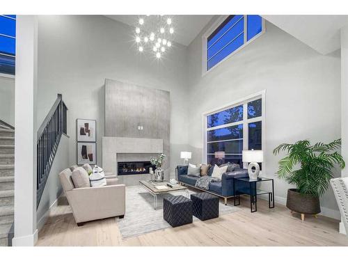 57 Rockcliff Terrace Nw, Calgary, AB - Indoor Photo Showing Living Room With Fireplace