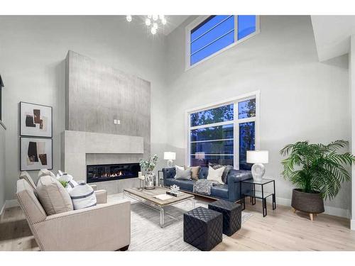 57 Rockcliff Terrace Nw, Calgary, AB - Indoor Photo Showing Living Room With Fireplace