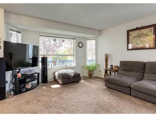 82 Applemead Court Se, Calgary, AB - Indoor Photo Showing Living Room