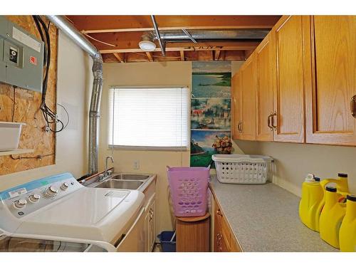 319 16 Street East, Brooks, AB - Indoor Photo Showing Laundry Room