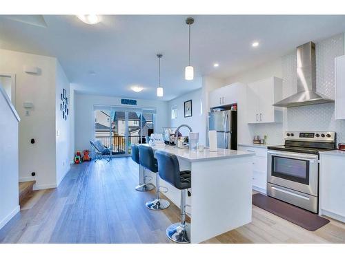 516 South Point Place Sw, Airdrie, AB - Indoor Photo Showing Kitchen With Upgraded Kitchen