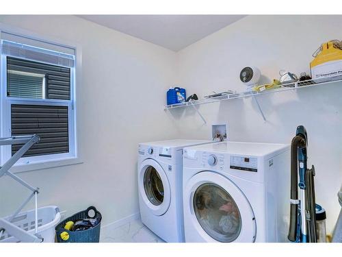 516 South Point Place Sw, Airdrie, AB - Indoor Photo Showing Laundry Room