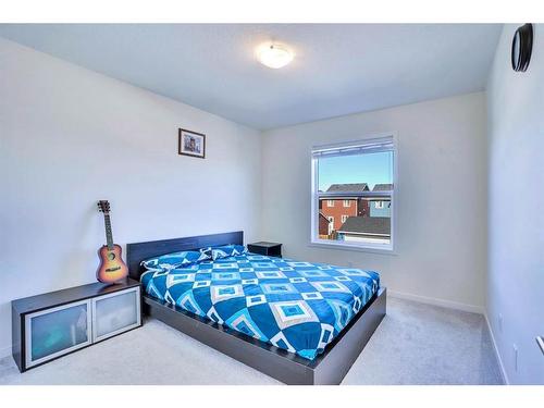 516 South Point Place Sw, Airdrie, AB - Indoor Photo Showing Bedroom