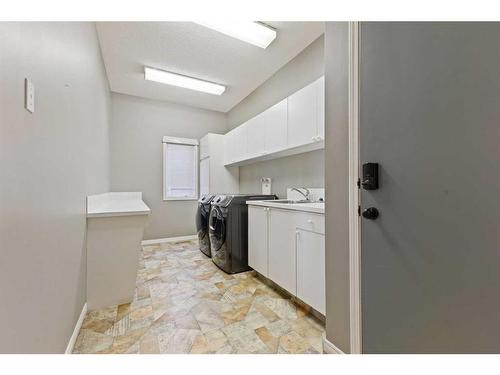 15 Suncastle Place Se, Calgary, AB - Indoor Photo Showing Laundry Room