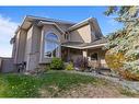 15 Suncastle Place Se, Calgary, AB  - Outdoor With Deck Patio Veranda With Facade 