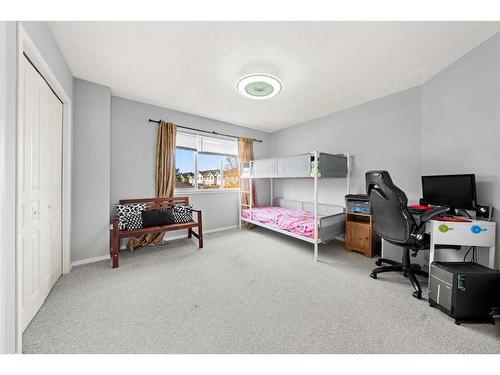 28 Bridleridge Gardens Sw, Calgary, AB - Indoor Photo Showing Other Room