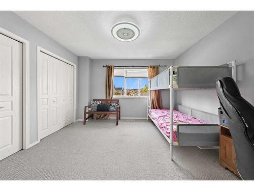 28 Bridleridge Gardens Sw, Calgary, AB - Indoor Photo Showing Bedroom