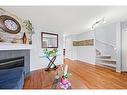 28 Bridleridge Gardens Sw, Calgary, AB  - Indoor Photo Showing Other Room With Fireplace 