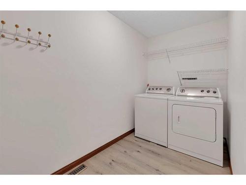 176 Panorama Hills Place Nw, Calgary, AB - Indoor Photo Showing Laundry Room