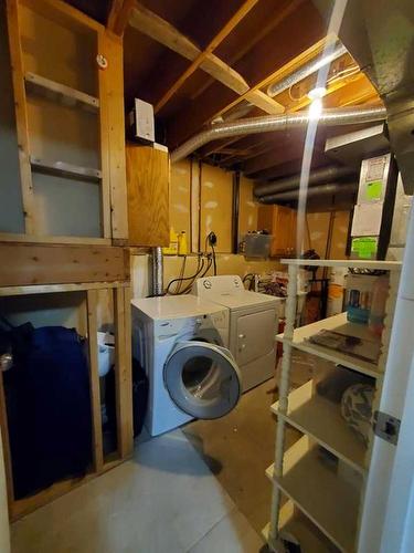 10-4740 Dalton Drive Nw, Calgary, AB - Indoor Photo Showing Laundry Room