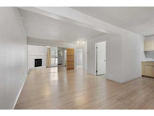 208-1528 11 Street, Calgary, AB - Indoor With Fireplace