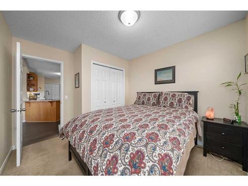 404-39 Hidden Creek Place Nw, Calgary, AB - Indoor Photo Showing Bedroom