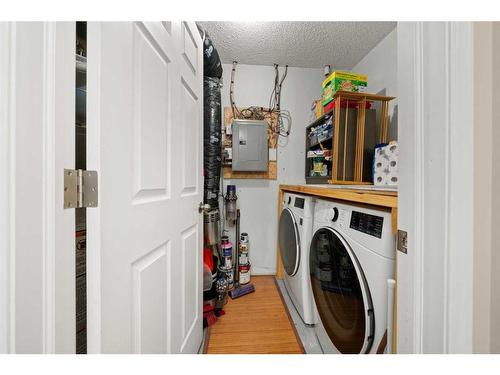 404-39 Hidden Creek Place Nw, Calgary, AB - Indoor Photo Showing Laundry Room