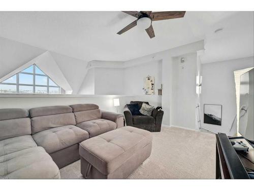 310-15204 Bannister Road Se, Calgary, AB - Indoor Photo Showing Living Room