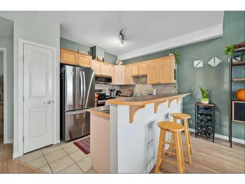 310-15204 Bannister Road Se, Calgary, AB - Indoor Photo Showing Kitchen