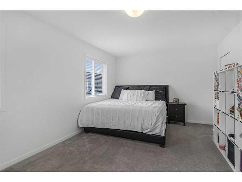 217 South Point Park Sw, Airdrie, AB - Indoor Photo Showing Bedroom