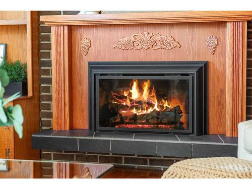 5842 Dalcastle Drive Nw, Calgary, AB - Indoor Photo Showing Living Room With Fireplace