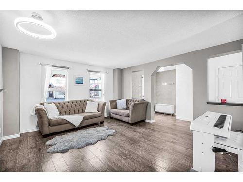 362 Copperfield Grove Se, Calgary, AB - Indoor Photo Showing Living Room