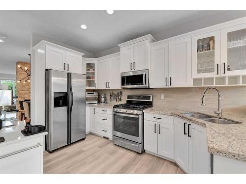 3118 38 Street Sw, Calgary, AB - Indoor Photo Showing Kitchen With Stainless Steel Kitchen With Double Sink