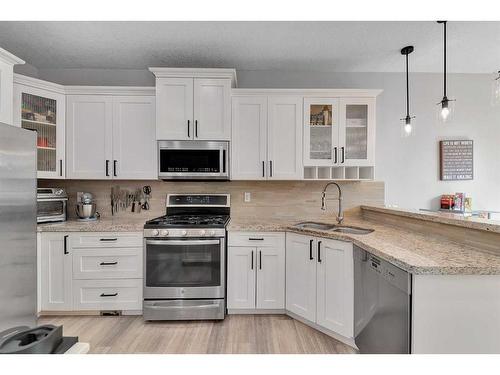 3118 38 Street Sw, Calgary, AB - Indoor Photo Showing Kitchen With Double Sink