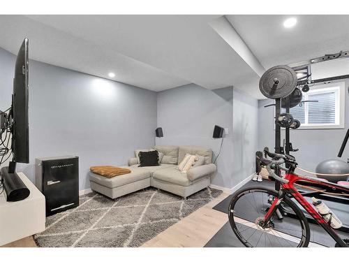 3118 38 Street Sw, Calgary, AB - Indoor Photo Showing Gym Room