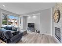 3118 38 Street Sw, Calgary, AB  - Indoor Photo Showing Living Room With Fireplace 