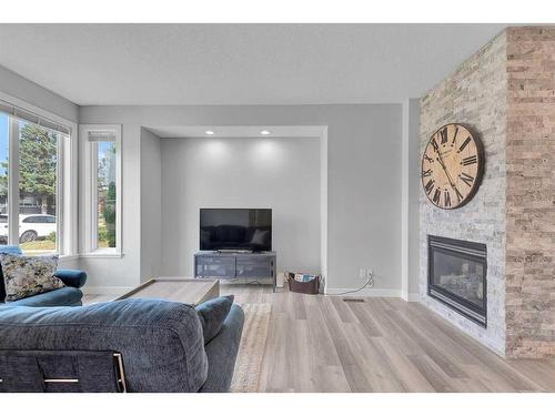 3118 38 Street Sw, Calgary, AB - Indoor Photo Showing Living Room With Fireplace