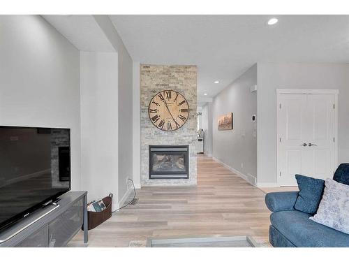 3118 38 Street Sw, Calgary, AB - Indoor Photo Showing Living Room With Fireplace