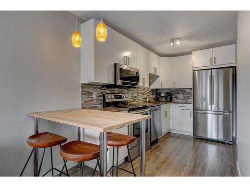 414-2204 1 Street Sw, Calgary, AB - Indoor Photo Showing Kitchen With Stainless Steel Kitchen