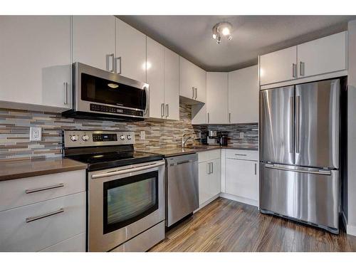 414-2204 1 Street Sw, Calgary, AB - Indoor Photo Showing Kitchen With Stainless Steel Kitchen With Upgraded Kitchen