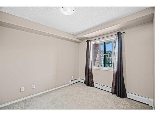 1311-81 Legacy Boulevard Se, Calgary, AB - Indoor Photo Showing Other Room