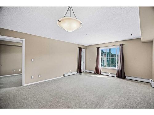 1311-81 Legacy Boulevard Se, Calgary, AB - Indoor Photo Showing Other Room