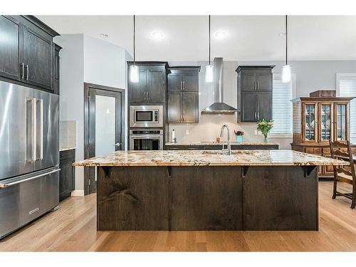 156 Ranch Road, Okotoks, AB - Indoor Photo Showing Kitchen With Upgraded Kitchen