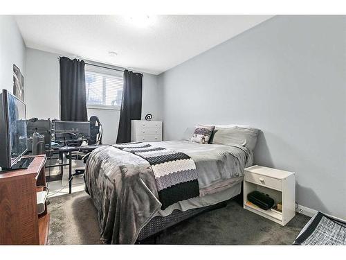 156 Ranch Road, Okotoks, AB - Indoor Photo Showing Bedroom