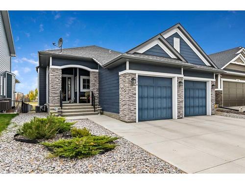 156 Ranch Road, Okotoks, AB - Outdoor With Facade