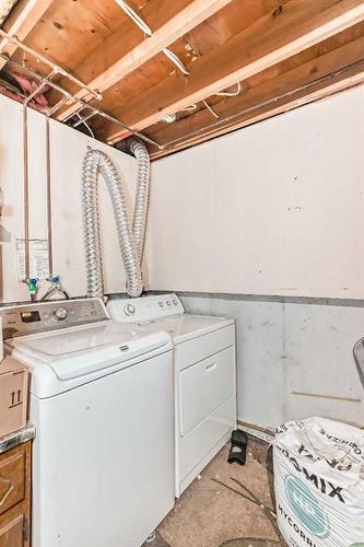 19-131 Templehill Drive Ne, Calgary, AB - Indoor Photo Showing Laundry Room