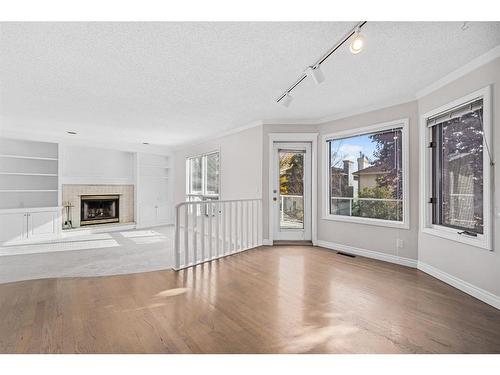 9051 Scurfield Drive Nw, Calgary, AB - Indoor With Fireplace