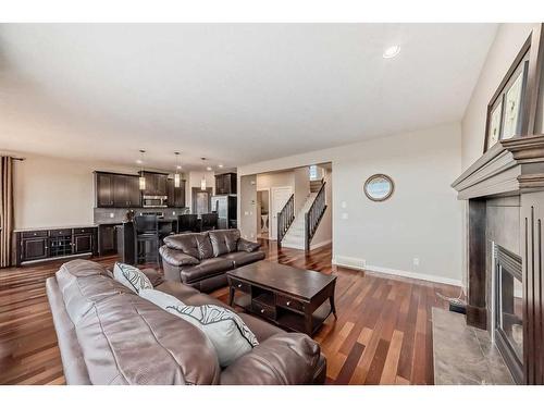 153 Everoak Circle Sw, Calgary, AB - Indoor Photo Showing Living Room With Fireplace