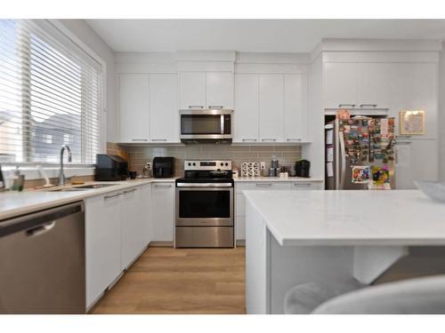 724 Redstone Crescent Ne, Calgary, AB - Indoor Photo Showing Kitchen With Double Sink