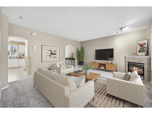 55 Citadel Point Nw, Calgary, AB - Indoor Photo Showing Living Room With Fireplace