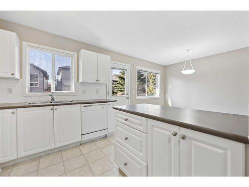 55 Citadel Point Nw, Calgary, AB - Indoor Photo Showing Kitchen With Double Sink